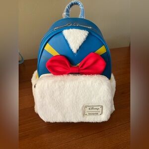 Donald Duck Loungefly Blue and White Backpack with Red Bow